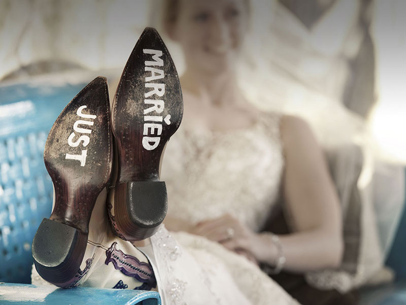 woman with just married painted on her boots